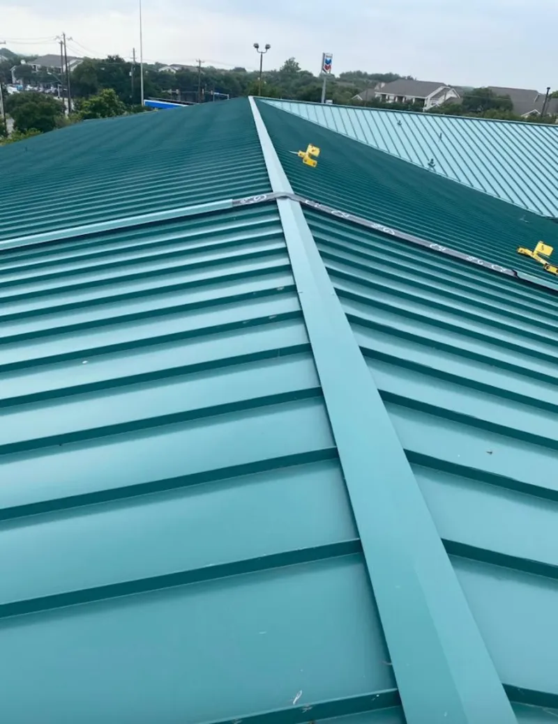 Green commercial metal roof ridge and valley for Metal Roof Repair in Phelps
