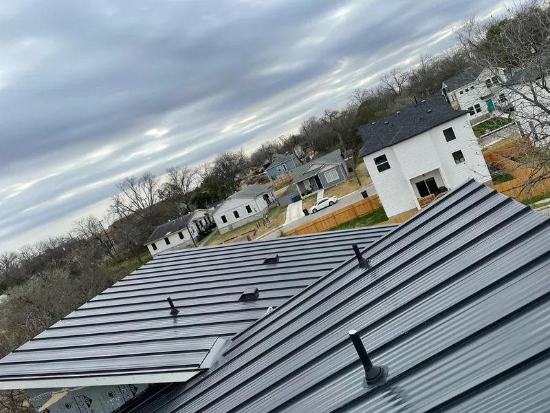 Standing seam metal roof panels with vents for Skylight Repair in Phelps